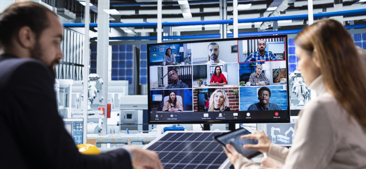 Investors in solar panels plant examine financial statements during videocall